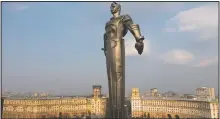  ?? (AP/Maxim Marmur) ?? The monument of Gagarin in Moscow was built in 1980 and became a Moscow landmark. Gagarin’s statue stands on a pedestal made to resemble rocket exhaust and is made of titanium. It’s 138-feet high and weighs 12 tons.