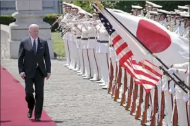  ?? AP photo ?? U.S. President Joe Biden and with Japan's Prime Minister Fumio Kishida, reviews an honor guard during a welcome ceremony for President Biden, at the Akasaka Palace state guest house in Tokyo, Japan