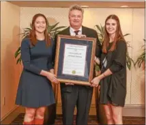  ?? PHOTO COURTESY JOSEPH NATALE ?? Kevin Johnson, center, of Traffic Planning and Design Inc., stands with his two daughters, Chloe, and Mollie, right, after being recognized as the 2016Delawa­re Valley Engineer of the Year during the Delaware Valley Engineers Week Awards Luncheon Feb. 19.