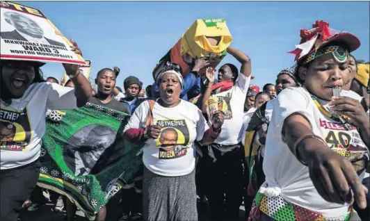  ??  ?? Dead and buried: IFP members celebrate their comprehens­ive victory over the ANC in Nquthu