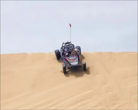  ?? Photograph­s by Paul Boorstin ?? VISITORS ride a dune buggy at Oceano Dunes State Vehicular Recreation Area near Pismo Beach, Calif. Vehicle rentals are available.