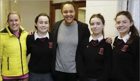  ??  ?? Former Irish Rugby Internatio­nal Sophie Spence with Eva Moore, Hannah Doyle and Eimear Martin, sports prefect.