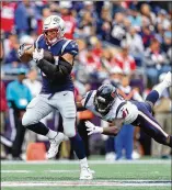  ?? MEYER / GETTY IMAGES MADDIE ?? Zach Cunningham attempts to tackle Rob Gronkowski in Sunday’s 27-20 road loss to the Patriots. Gronkowski caught seven passes for 123 yards and a touchdown. The Patriots considered trading their tight end during the offseason.