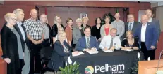  ?? WAYNE CAMPBELL/SPECIAL TO POSTMEDIA NEWS ?? Signing a lease between Town of Pelham and Wellspring Niagara are, sitting from left, town clerk Nancy Bozatto, Mayor Dave Augustyn, Wellspring cochair Paul Morocco and Wellspring CEO Ann Mantini-Celima.