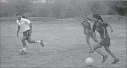  ?? Associated Press ?? Senior students of Yuwa, a non-profit organizati­on teaching girls soccer, practice early morning in Ormanjhi, Jharkhand state, India.