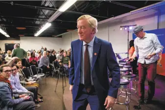  ?? Andrew Harnik / Associated Press ?? Former Massachuse­tts Gov. Bill Weld, a Republican candidate taking on President Trump, steps off stage after speaking at a the Faith, Politics and the Common Good Forum in Iowa.