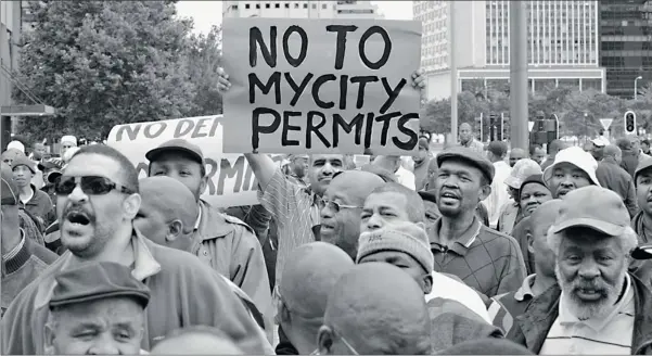  ?? PICTURE: HENK KRUGER ?? MUSCLE: Taxi owners protest against the MyCiTi bus system. Such continuing opposition is proof that thousands of commuters’ interests are held hostage by a smaller, but more highly organised, narrow-interest group, say the authors.