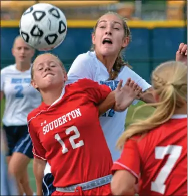 ?? For Montgomery Media / MARK C. PSORAS ?? Souderton’s Caitlin Duddy and North Penn’s Mackenzie Daniels battle for a ball in the air during Thursday’s Suburban One Continenta­l Conference action.