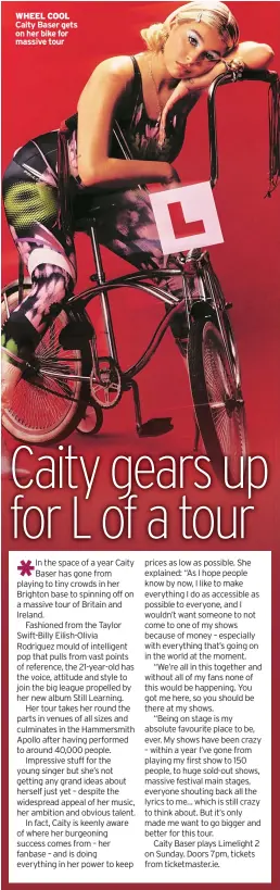  ?? ?? WHEEL COOL Caity Baser gets on her bike for massive tour