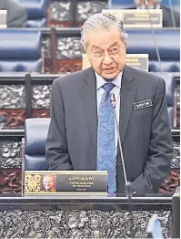  ?? — Gambar Bernama ?? JAWAB SOALAN: Dr Mahathir menjawab soalan pada sidang Dewan Rakyat di Parlimen semalam.