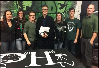  ??  ?? Ira Glass, host and executive producer of the national radio show “This American Life,” visited Payson High School recently to interview students about their tradition of “going all out” when asking dates to dances.