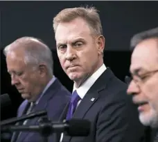  ?? Jacquelyn Martin/Associated Press ?? Undersecre­tary of State for Political Affairs Thomas Shannon, left, and Deputy Defense Secretary Patrick Shanahan listen as Deputy Energy Secretary Dan Brouillett­e, right, speaks during a news conference on the 2018 Nuclear Posture Review at the...