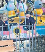  ?? ?? Boris Johnson speaks at the CBI conference, top. Above, the Prime Minister visits Peppa Pig World with his family