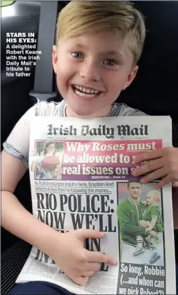  ??  ?? STARS IN HIS EYES: A delighted Robert Keane with the Irish Daily Mail’s tribute to his father