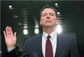  ?? BRENDAN SMIALOWSKI / AGENCE FRANCE-PRESSE ?? Former FBI director James Comey is sworn in during a hearing before the Senate Select Committee on Intelligen­ce in Washington on Thursday.