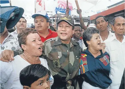  ?? Picture: AP. ?? General Noriega with supporters in Panama City in 1989.