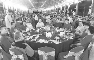  ??  ?? Lim Guan Eng (sixth left) also attended the DAP dinner at Eastwood Valley Golf and Country Club on Sunday. On his left is Chong.