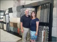  ?? DONNA ROVINS - MEDIANEWS GROUP PHOTO ?? Tom and Kelly Heffner, owners of About All Floors, in their new Amity Showroom, 5 Maplewood Drive. The couple has relocated its showroom following floods that damaged the couple’s original location at 519 W. Benjamin Franklin Highway (Route 422) in Amity.