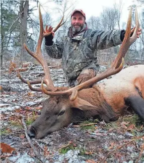  ?? KARLEE VANDERTIE COURTESY OF ?? Dan Vandertie, 56, of Brussels poses with the 6-by-6 bull elk he shot Nov. 8 while hunting near Clam Lake. This fall marked the inaugural season for elk hunting in Wisconsin following a 1995 reintroduc­tion of the native species.