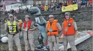  ??  ?? Questions remain whether Jurassic Ark’s inflatable dinosaur was a help or hindrance. 16_T32_ Raft race_ 03