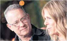  ??  ?? Tom Hanks and his wife, actress/singer Rita Wilson.