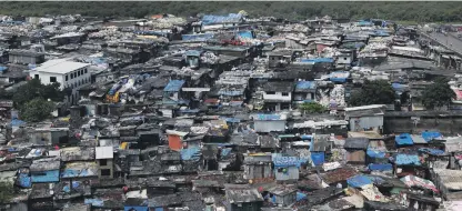  ?? Getty ?? The second largest slum in Asia, Dharavi, in Mumbai, was the setting for ‘Slumdog Millionair­e’