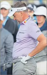  ??  ?? A downcast Ian Poulter on Friday night
