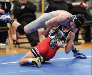  ?? Photo by Jerry Silberman / risportsph­oto.com ?? Tho Rhode Island wrestlers who could reach the podium at New England this weekend is Cumberland sophomore Brady Gillis (top) and Coventry 106-pound state champion Joziah Fry.