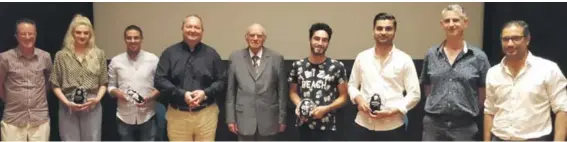  ??  ?? President Emeritus Dr Mifsud Bonnici with MCAST chairman Frederick Schembri (on his right), FTFEĠ secretary Malcolm J. Naudi (first from left) and the four students who collected trophies during the ICA awards with Mr Grima and Mr Attard on right