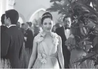  ?? SANJA BUCKO/WARNER BROS. PICTURES VIA AP ?? Constance Wu performs in a scene from “Crazy Rich Asians,” which hits theaters Aug. 17.