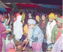  ??  ?? Stella E. Okotete with women during Iftar at Abaji