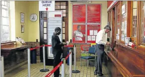  ?? Picture: THE TIMES ?? DARK CLOUD: A looming strike could undermine the Post Office’s attempt to nail down the funding required for its turnaround plan.