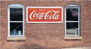  ?? OLIVIER DOULIERY AFP VIA GETTY IMAGES FILE PHOTO ?? Coca-Cola plans to launch an alcoholic sparkling water, joining the fray of beverage giants vying for market share as consumers flock to hard seltzer for its minimal calories, lower alcohol level.