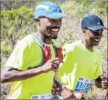  ??  ?? SMILES OF SUCCESS: Men’s race winners Edwin Sesipi, left, and Givemore Mudzingany­ama.