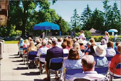  ?? Grace Duffield / Hearst Connecticu­t Media ?? The sign for the Steve Benko Pool was unveiled at a dedication ceremony for the recreation director who served the town for 50 years. It took place at Waveny Park in New Canaan on June 4.