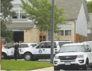  ?? RJ Sangosti, The Denver Post ?? Denver police officers on Wednesday morning were still at the Montbello home where the body of 7-yearold Jordan Vong was found Tuesday night.