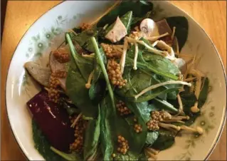  ?? ALANA HUDSON, SPECIAL TO THE HAMILTON SPECTATOR ?? A healthy option mixing sweet and tart flavours, the enoki salad titillated the tastebuds.