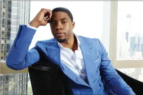  ?? PHOTO BY DAN HALLMAN/INVISION/AP, FILE ?? FILE - This July 21, 2014 file photo shows actor Chadwick Boseman posing for a portrait in New York. Boseman, who played Black icons Jackie Robinson and James Brown before finding fame as the regal Black Panther in the Marvel cinematic universe, has died of cancer. His representa­tive says Boseman died Friday, Aug. 28, 2020 in Los Angeles after a four-year battle with colon cancer. He was 43.