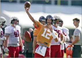  ?? AP PHOTO/CHRIS O’MEARA ?? Tampa Bay Buccaneers quarterbac­k Tom Brady throws a pass during an NFL football training camp practice Saturday, July 30, 2022, in Tampa, Fla.