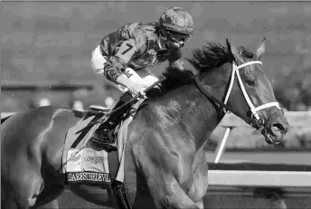  ?? BARBARA D. LIVINGSTON ?? Shedaresth­edevil wins the Kentucky Oaks for 30-year-old owner Staton Flurry.