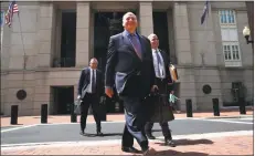  ?? Jacquelyn Martin / Associated Press ?? The defense team for Paul Manafort, including Thomas Zehnle, center, and Jay Nanavati, right, on Thursday leaves federal court for a lunch break.