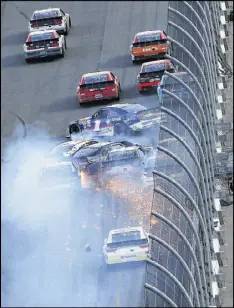  ?? BRIAN LAWDERMILK / GETTY IMAGES ?? A wreck during Saturday’s Xfinity Series race sent Kyle Busch into an unprotecte­d concrete wall, leaving the driver with a broken leg and foot.