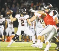  ?? Gregory Vasil / For Hearst Connecticu­t Media ?? Shelton QB Jake Roberts looks to pass against Masuk on Friday at Masuk High School in Monroe.