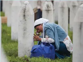  ?? EPA ?? Gravestone­s at The Memorial Centre in Bosnia and Herzegovin­a mark the lives of 8,000 Bosnian Muslim men and boys murdered in July 1995