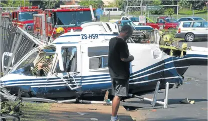  ?? Picture: MARK WING ?? FATEFUL FLIGHT: This helicopter crashed as it was taking bridegroom Rishi Ramdeo, from Trinidad, to his wedding at the botanical gardens in Pietermari­tzburg yesterday. Ramdeo, his parents and the pilot were all taken to hospital with injuries