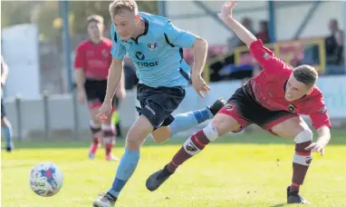  ??  ?? Runcorn Town full-back Liam Turner was on the mark from the spot to help win the tie