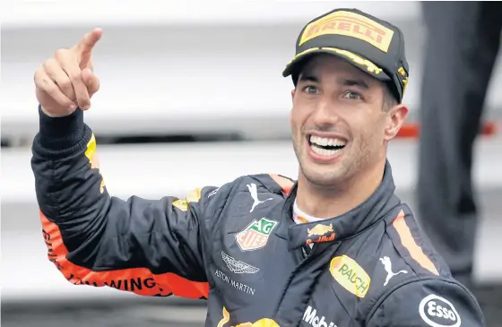  ??  ?? Red Bull driver Daniel Ricciardo celebrates winning the Monaco Grand Prix last month.