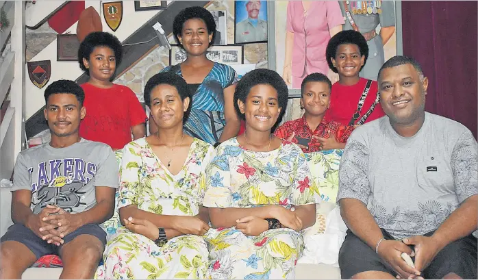  ?? Picture: TEMALESI VONO ?? Singer Samisoni Waqavakato­ga (front right) with his nieces and nephews at Laucala Beach in Suva.