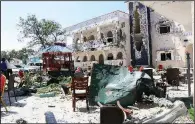  ?? AP ?? The damaged Asasey Hotel is shown Saturday after the attack in Kismayo, Somalia.