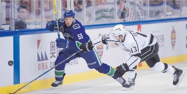  ?? — GETTY IMAGES FILES ?? Vancouver Canucks defenceman Alex Biega, left, played 44 times for the Canucks in the 2017-18 regular season and the 30-year-old defenceman says he worked diligently on his game during the off-season in hopes of earning his spot with the 2018-19 squad.